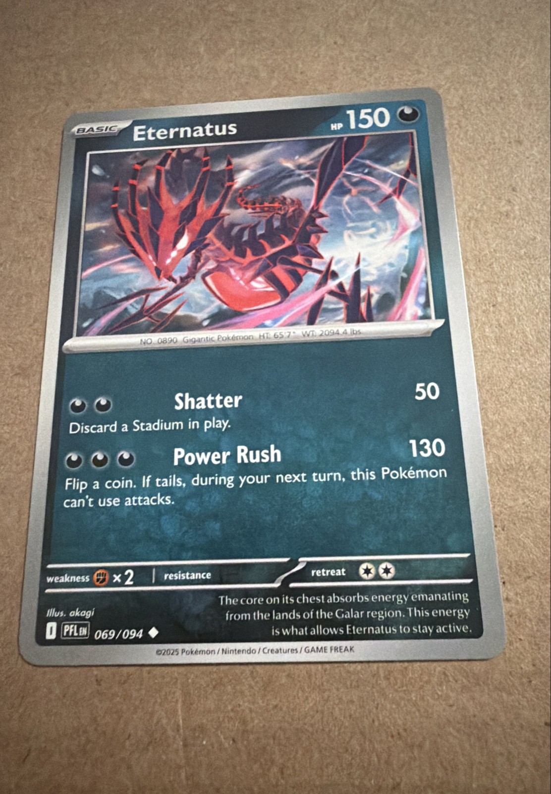Eternatus 069/094 Me02: Phantasmal Flames Regular