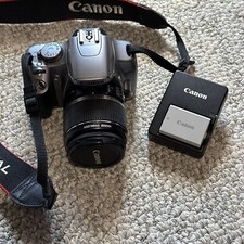 Canon EOS Rebel XSi DS126181 12.2-MP Digital SLR With 18mm-55mm Lens, Charger