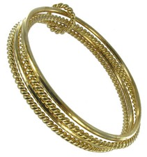 Thin Gold Tone Metal Twist Set Of 4 Bangle Bracelet 7 1/2"