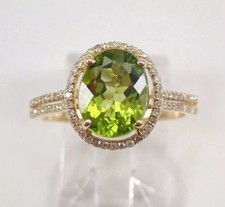 2.00 Ct Oval Cut Lab-Created Peridot Halo Engagement Ring 14K Yellow Gold Plated