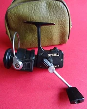 A VERY GOOD VINTAGE MITCHELL 2230Z FISHING REEL + VINYL CASE