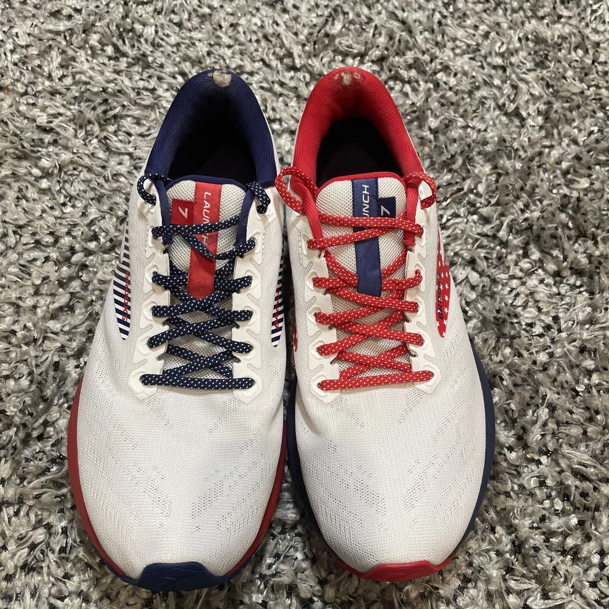 Brooks red white top and blue sneakers