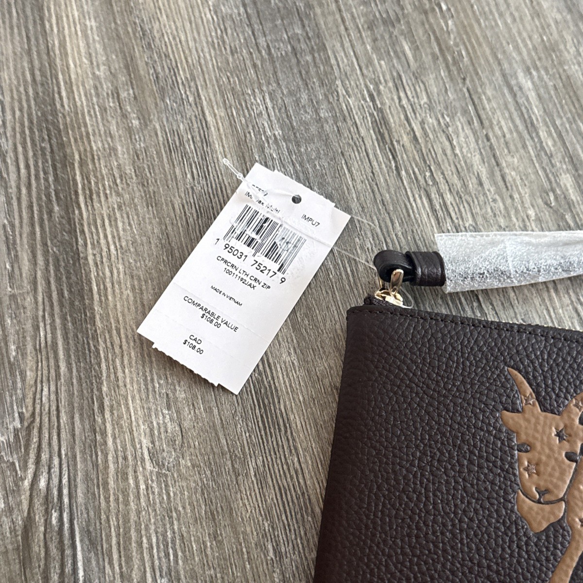 NWT COACH Oak Brown CORNER ZIP WRISTLET WITH Capricorn Goat PRINT
