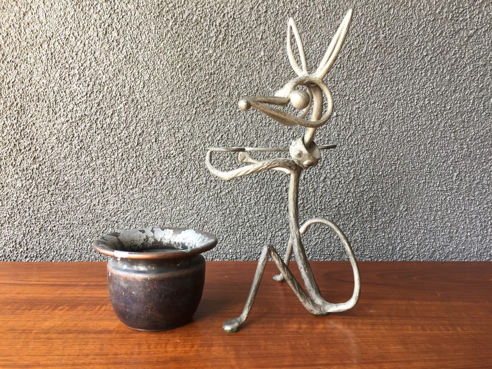Named-artist abstract wire dog sculpture from the Eames era — a whimsical, conversation-starting piece of actual mid-century fine art.