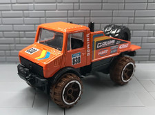 Mercedes Benz Unimog 1300L  Hot Wheels  orang...