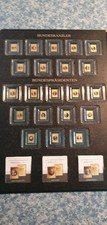 42 Goldbarren mit Zertifikat und Sammelmappe / 1/1000 oz / 999er Feingold