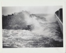 8X10 PHOTO OF WAVES CRASHING ON FLOODING BRIDGE