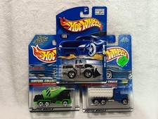 Hot Wheels Lot of 3 Construction Trucks - Cement truck, Wheel Loader, Peterbilt