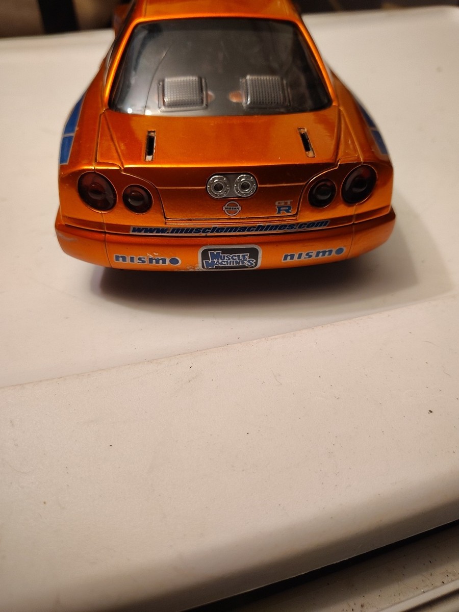Muscle Machines Import Tuner 1/18 Scale 2000 Orange Nissan Skyline
