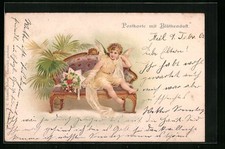 Fragrance postcard angel with bouquet of flowers on a couch, with fragrance 1909 