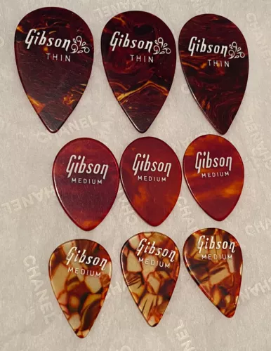 Vintage Guitar Picks- 1960’s & 70’s GIBSON Lot of 9 picks. unused New Old Stock