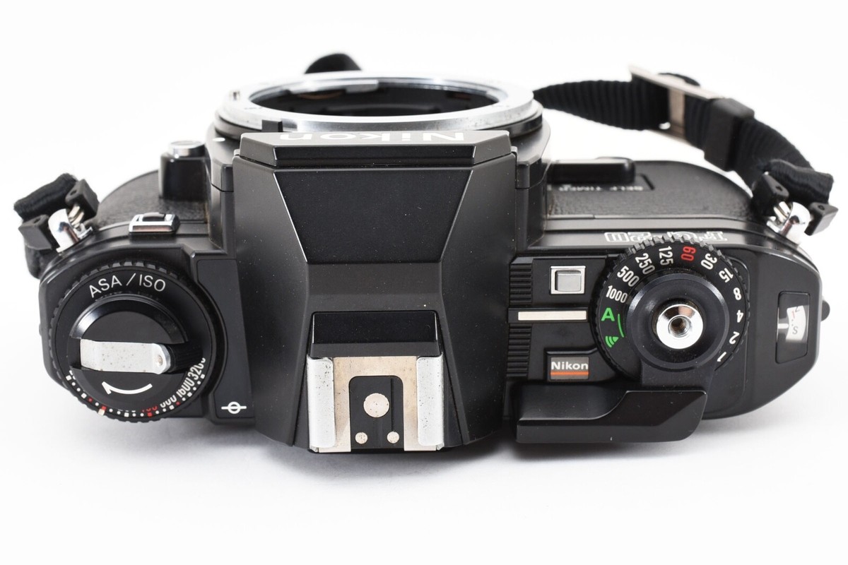 Near MINT Nikon FG-20 35mm SLR Film Camera Black Body Only from