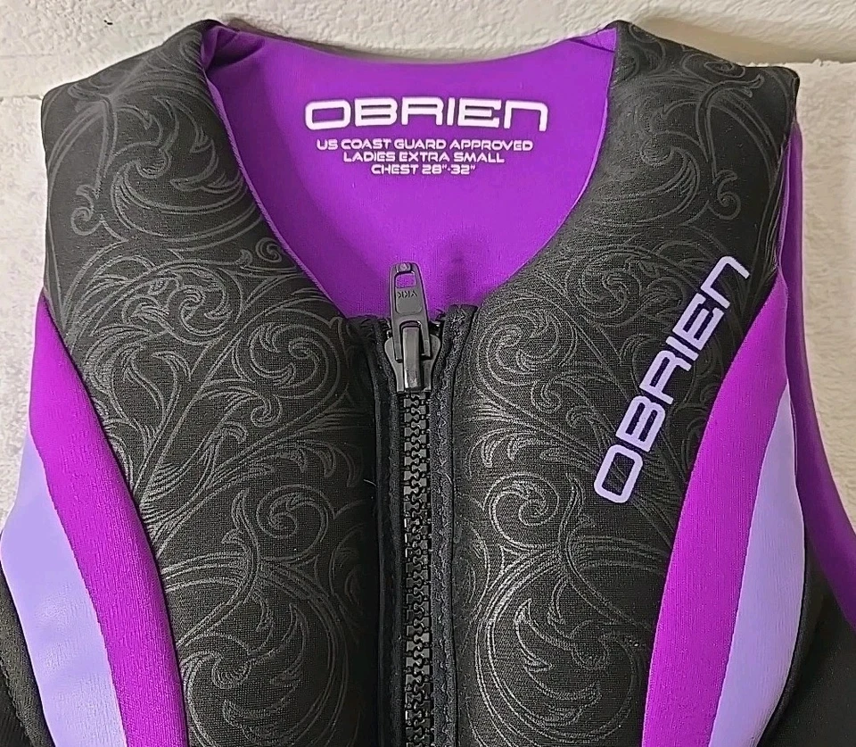 Chaleco salvavidas O'Brien para damas aprobado por la USCG púrpura/negro extra pequeño 28"-32" Foto 3 de 4