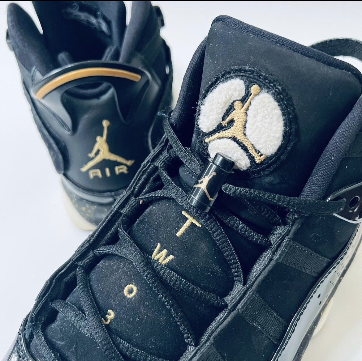 jordan 6 black and gold on feet