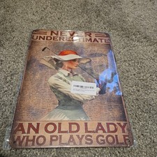 Golf Never Underestimate A Lady Tin Metal Signs Home D cor 12x8 unopened