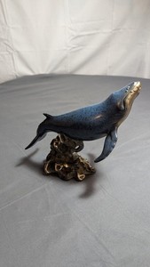 Big Sky Carvers Stonecast Humpback Whale Sculpture on Coral 
