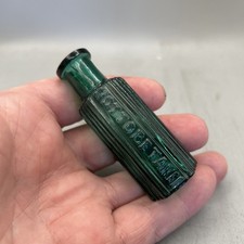 76 MM TALL TEAL GREEN GENUINE VICTORIAN POISON BOTTLE EMBOSSED NOT TO BE TAKEN