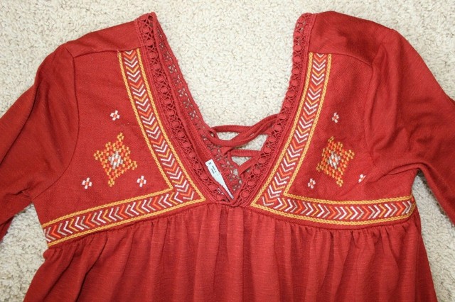 rust red blouse