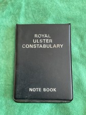 Royal Ulster Constabulary Plastic Notebook Cover with guidance notes inside.