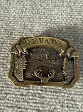 Nevada The Great American Buckle Co Chicago Brass Buck Belt Buckle 1980 USA