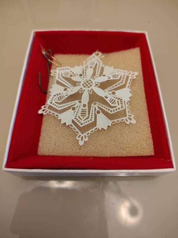 Delicate White Metal Snowflake Ornament