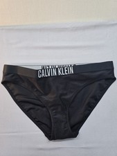 Slip bikini Calvin Klein nero con logo a rete L nuovo con etichette
