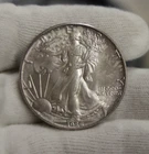 1986 US Silver Eagle $1 Unc Key Date First Year Light Toning