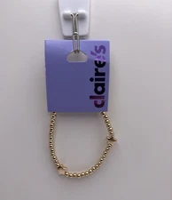 New Gold Stretch Beaded Bracelet with Stars from Claire's