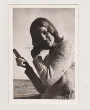 Lovely Young Woman Styling Her Hair by the Shoreline Beach Beauty Snapshot