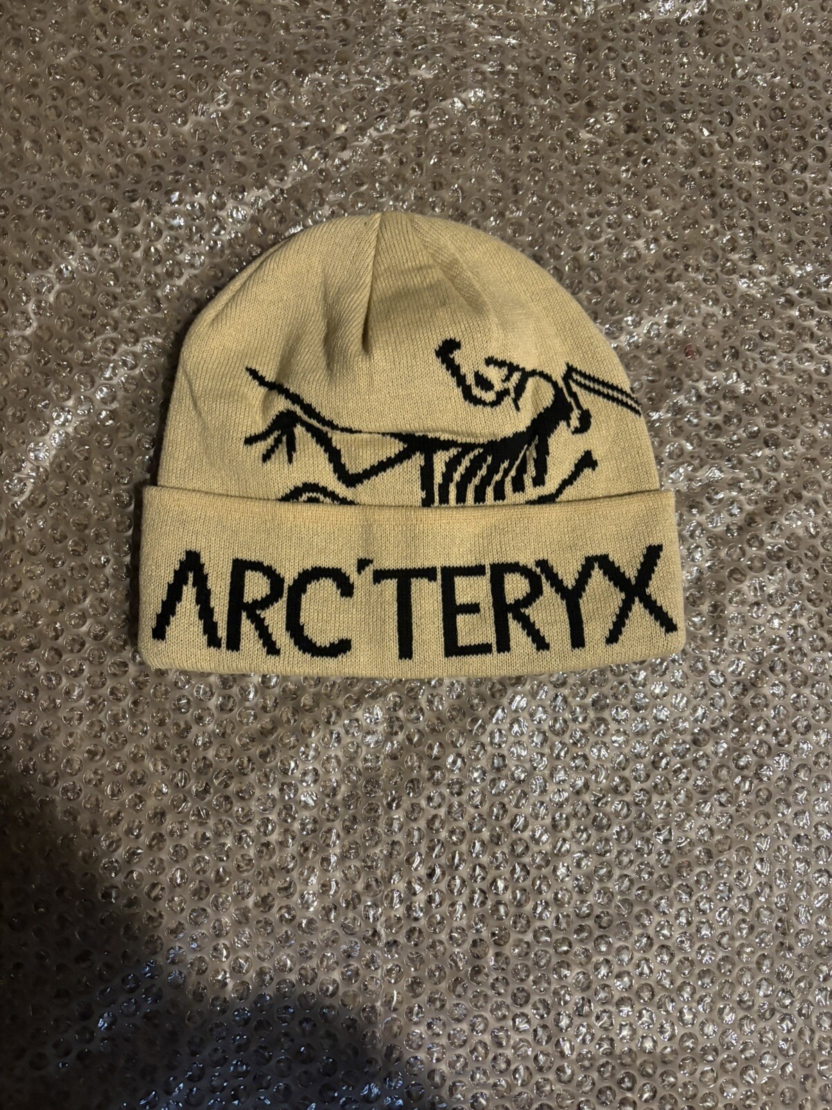 ARC'TERYX Berretto Arc’teryx marrone scuro nero escursionismo Gorpcore con polsini spedizione gratuita