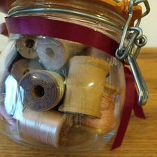 VTG Canister Jar w/ Mixed Lot of Old Wooden Thread Spools, Needle, Thimble