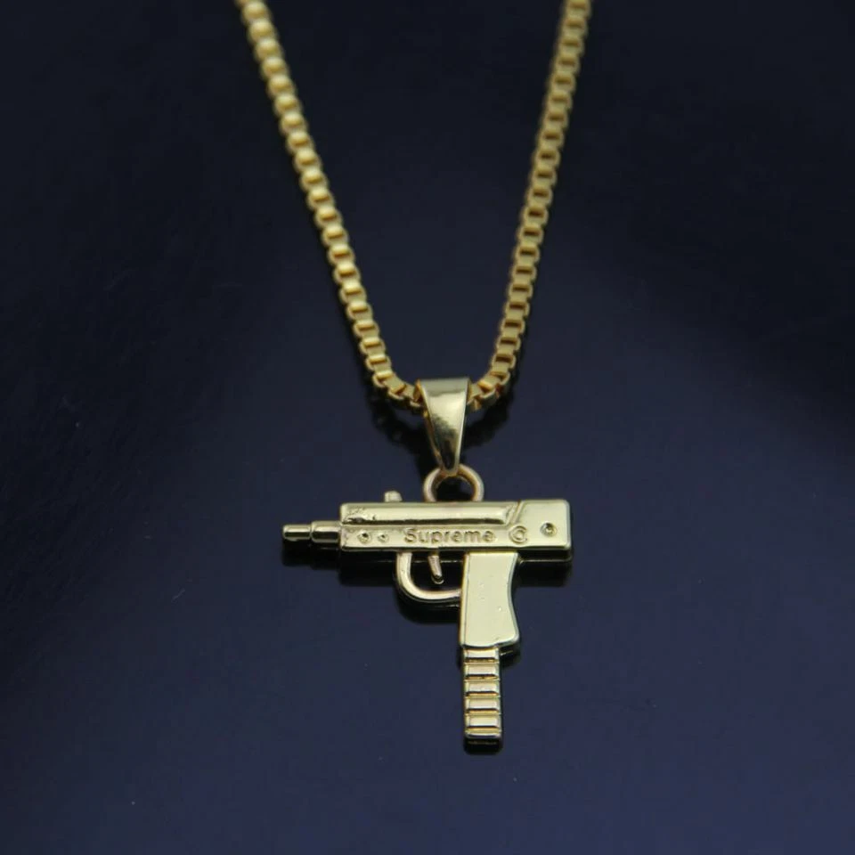 Supreme 2024 gold pendant