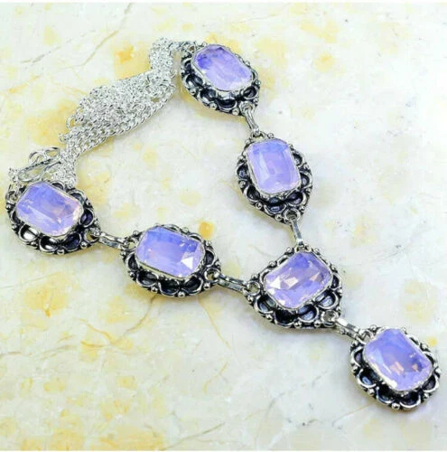 Gioielli antichi in argento con pietra principale opale