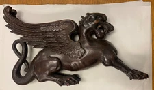 Pair of antique carved griffins gargoyles