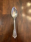 A Grand Baroque Sterling Silver Serving Spoon  8.75 Inches Long. 107 Grams