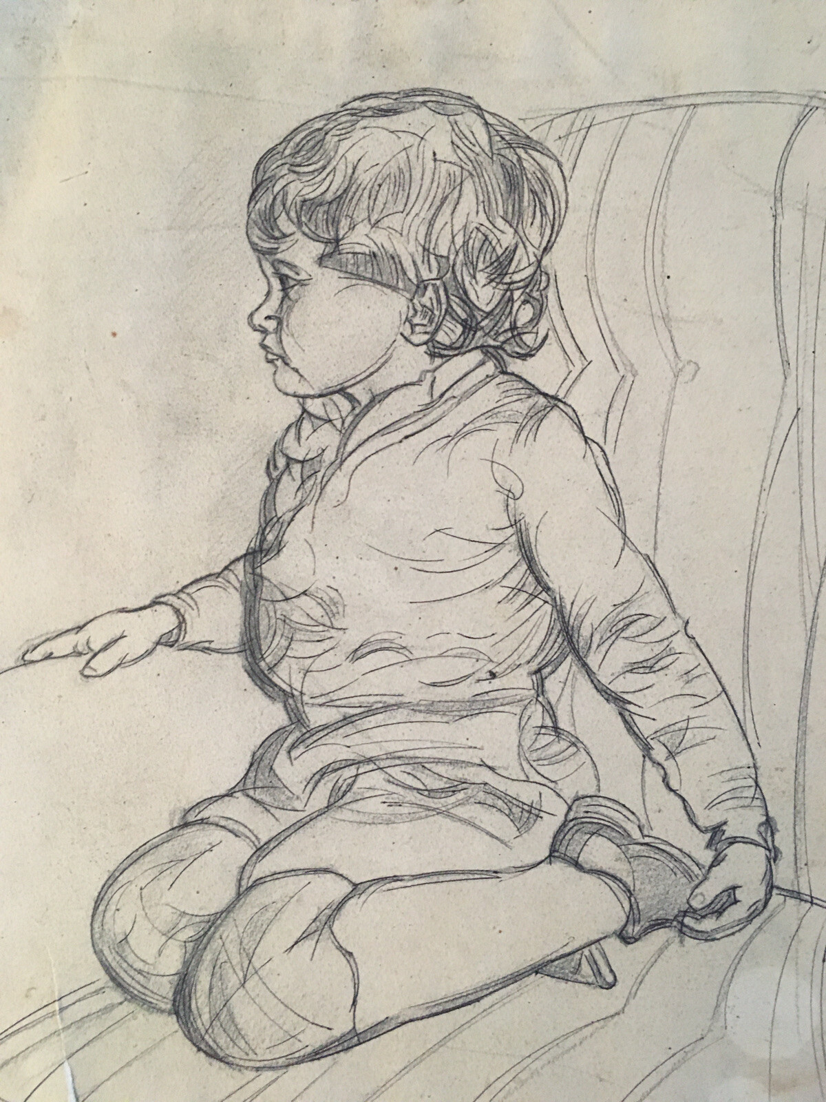 Beautiful drawing portrait child boy armchair on pencil paper Michel Rauly