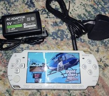PSP 2000 Console With Charger And Games .Fully Working