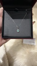 9ct White Gold 0.06ct Diamond and Emerald Halo Pendant