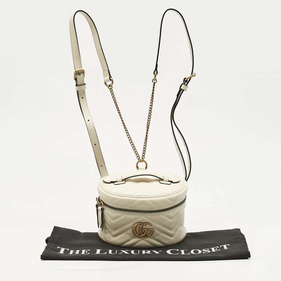 Mochila Gucci Off White Cuero Matelasse GG Marmont Estuche Tocador Foto 4 de 4
