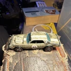 Hot Wheels Redline 1969 Nitty Gritty Kitty’ Mercury Gold/White Diecast Car