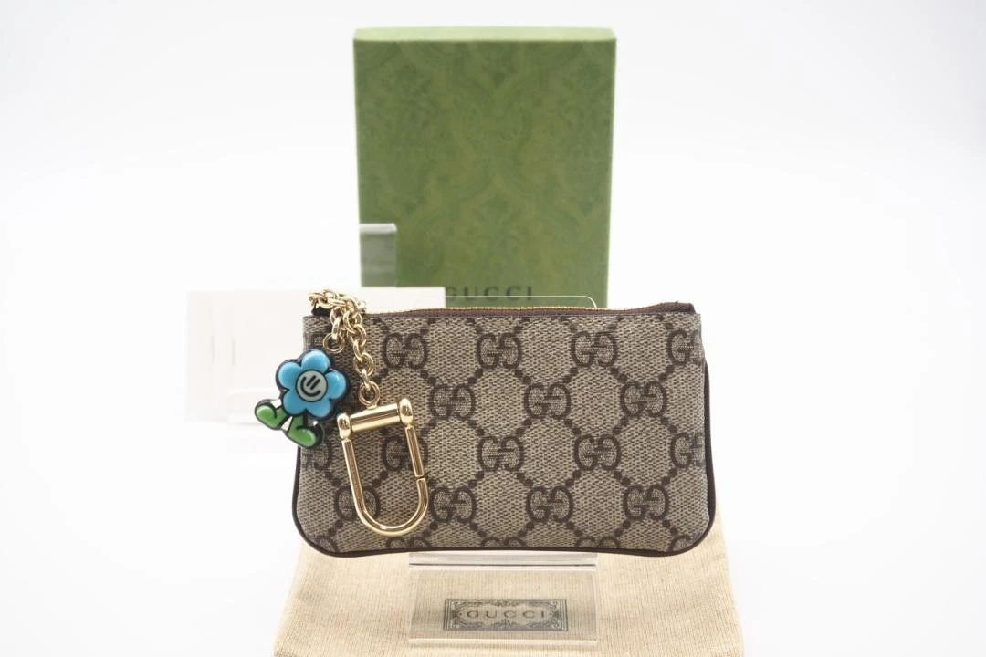 Authentique porte monnaie Gucci couleur beige bleu L13 cm H7,5 cm fermeture éclair PVC cuir