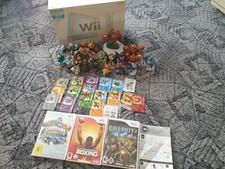 wii gerät ,3× spiele,18×skylanders Giants 2×disney figuren,18 karten ,portal