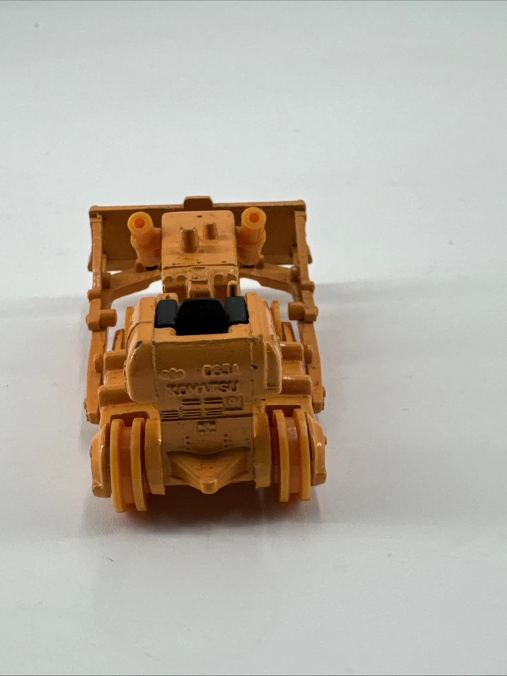 Bulldozer Tomica Komatsu D65A 1974 raro de colección sin pistas #70 1:87 Japón Foto 3 de 4