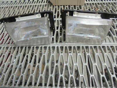 DE TOMASO MINI TURBO PAIR OF TROLLEY HEADLIGHTS H4 COMPLETE