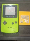 Game Boy Color with Yellow Pikachu Game Cartridge
