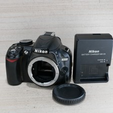 Nikon D3100 14 MP DSLR Camera body GOOD/TESTED SHUTTER 7,718 W Charger