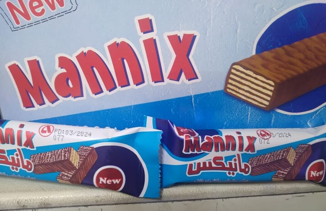 A New Wafer Stick Dipped In Chocolate From Manix A Box Containing