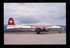 Aviation Airplane Airline postcard Transvalair Canadair CL-44 HB-IEO c/n 32 JJ 9