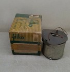 Gray metal SW105 Filko ignition coil with red and green printed box labeled “SW105 Filko and Coil.”