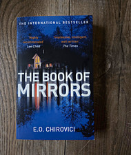 The Book of Mirrors - E. O. Chirovici | Thril...